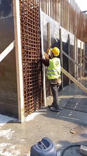 Reinforcing Concrete Walls with Metal Rebar Installation
