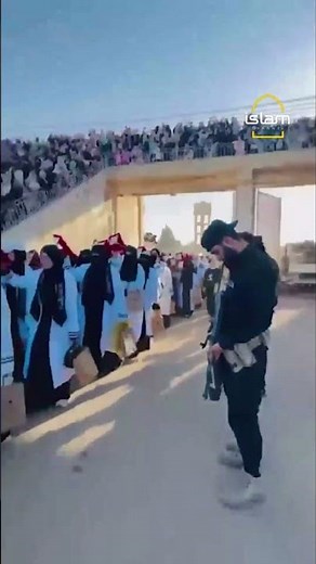 Syrian security lowers gaze as hafiz girls enter