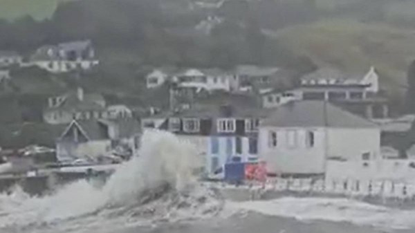 Tesco delivery van is smashed by waves in South West storm