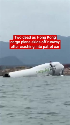 Two dead as Hong Kong cargo plane skids off runway after crashing into patrol car | The Independent
