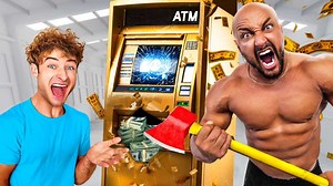 WORLD'S STRONGEST MAN vs. $100,000 ATM! | Topper Guild Vlog