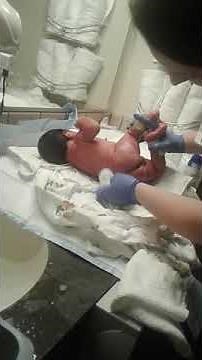 Babys first bath at hospital