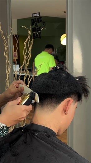 Master the Middle Part Mid Taper Haircut Technique
