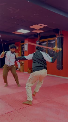 🗡️ Experience the art of Kalari and the thrill of sword fighting. #Kalari #SwordFight #MartialArts | Kalari Coach