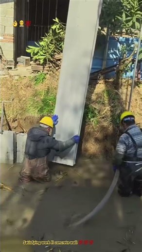 Smart operator pressing concrete panel under water exactly