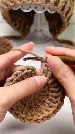 handicrafts by weaving thread into hats
