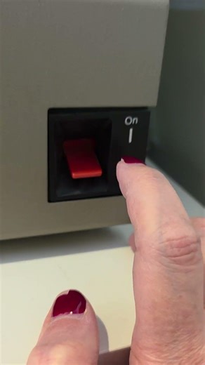 The original IBM PC power switch and the power switch on my mini-IBM