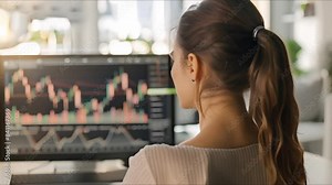 Young woman analyzing Japanese candlestick charts in stock market from home. Concept Stock Market Analysis, Japanese Candlestick Charts, Home Office Setup, Young Woman, Financial Market