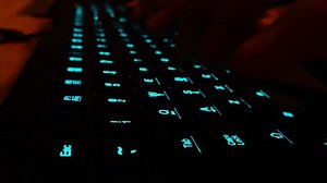 Writing on Keyboard with blue light
