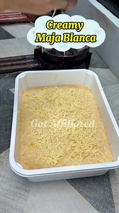 This creamy maja blanca delivers a smooth, luscious take on the classic Filipino dessert, made rich with coconut milk and finished with a soft, custard-like texture that melts in every bite; gently sweet and perfectly balanced, it features tender corn kernels for subtle crunch, sets beautifully for clean slices, and serves as an elegant yet comforting treat ideal for family gatherings, celebrations, or a simple make-ahead dessert that tastes even better chilled. #maja #majablanca | GOT Affiliate
