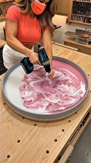 Satisfying resin pour that turned into the most beautiful pink marble table ever 🌸