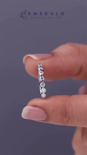 Celebrate your love with the sleek and stylish Round Floating Bubble Wedding Band