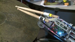 Musician gets bionic drumming arm