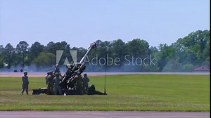 Huge explosions accompany an artillery display by the U.S. Army.