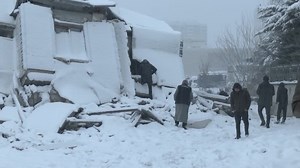 Families beg for help to find loved ones in snow-covered earthquake debris