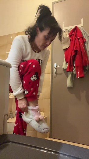 Putting on a Mickey Mouse Slipper: Cozy Home Moments