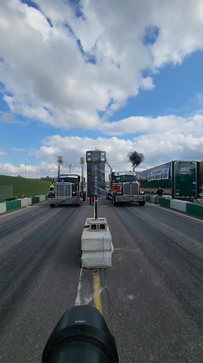 Western Star vs tire shredding Peterbilt on the uphill drag strip. #Peterbilt #westernstar #notraction #burnout #bigrigracing #semis #largecars #uncsfallbrawl | BUILT Diesel MAFIA