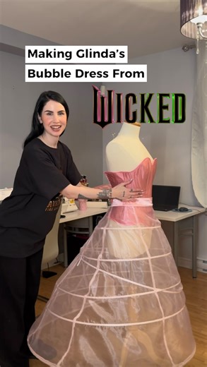 Carmen V. Estrada on Instagram: "Glinda update! ✨ Here’s how I made the hoop skirt! It took a lot longer than I thought and a lot of trial and error to get the right shape and make sure the spring steel boning was overlapping correctly. It’s not perfect, but overall, I’m really happy with how it turned out! I’m also so happy I can move onto the next steps! A huge thank you to @bellamaesdesigns who’s YT videos helped me a lot while I was planning/patterning! Stay tuned for the next part! #glinda