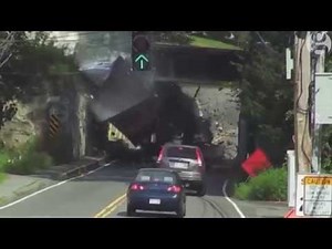 Truck roof torn off by low bridge near Boston