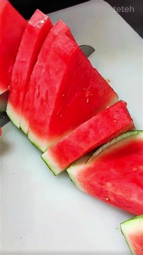 Slicing of Fresh Watermelon into Perfect Triangles Using a Sharp Chef Knife