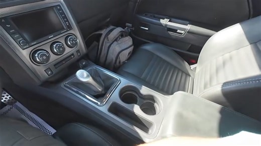 Test Drive 2013 Dodge Challenger RT 5.7 HEMI V-8 engine, 6-speed manual transmission, power steering, power 4-wheel disc brakes, air conditioning, cold air intake, dual exhaust with Flowmasters, leather interior with bucket seats and console, loaded with power options, sunroof, tint, front and rear spoilers, 20" chrome wheels, Only 26K miles. Stock#2558 $26,900 #challenger #lowmiles #v8 #dodge #hemi #rt #deals #forsale #usa #mopar #6speed | Maple Motors