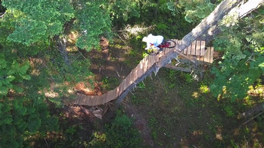 VIDEO: Mountain Biker Drops Impossibly Steep 67-Foot High Roll In