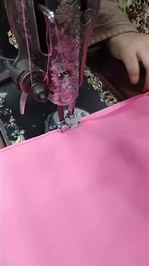 Sewing Pink Fabric: Close-Up Hand Techniques