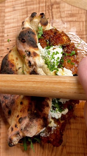 The Lemon Pepper Chicken Pizza Sandwich is a vibrant mix of fresh, tangy, and savory flavors. The thin, crispy chicken cutlet is exactly how I like it, delivering that perfect crunch. The zesty lemon pepper sauce adds a bright, fresh kick, balanced with just a touch of honey for sweetness. Arugula works so well here, adding a peppery bite, while creamy mozzarella contrasts beautifully with the tangy sauce. The homemade lemon pepper ranch brings a cool, creamy finish, and Parmesan ties everything