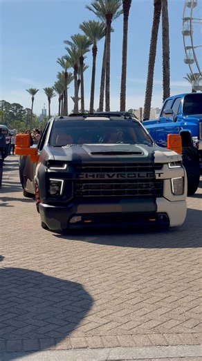 Young Dolph Wrapped Chevrolet 3500 Dually Rolling Into Orange Beach Invasion #sickslammedtrucks #baggedtrucks #duallytrucks | SICK Slammed Trucks