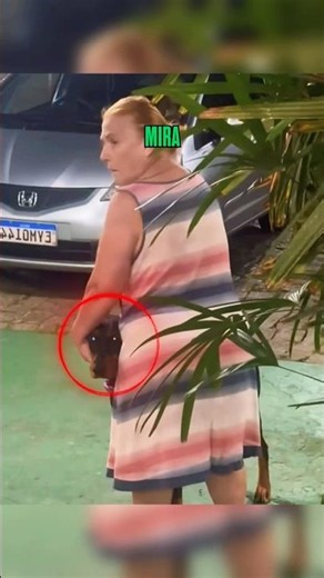 The Doberman spotted the stranger before anyone else
