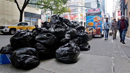 NYC program aims to place garbage in large bins to clean up sidewalks