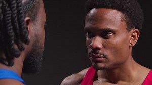 Free stock video - Close up of male boxer and opponent standing face to face before boxing match staring at each other 5