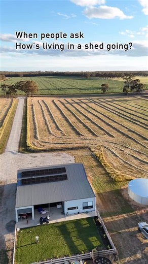 Kristian Frank Georgia Frank on Instagram: "People ask us, “So… how’s living in an off-grid shed going?” And honestly? It’s amazing. It’s chaotic. It’s hot. It’s cold. It’s perfect. It’s hectic. It’s everything in between. We stripped life right back. No big fancy house. No monster home loan. No pretending we need more than we actually do. We sleep in our caravan — inside the shed. Cook in our kitchen — inside the shed. Shower in our bathroom — inside the shed. Running on water tanks and off-gri