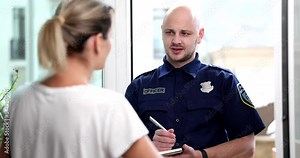 Police officer interrogating woman witness in criminal case at home 4k movie slow motion