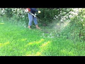 Stihl FS450 strimmer / brush cutter in action . Weed eater , whipper snipper.