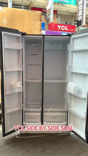 TCL P635SBSS side-by-side refrigerator. Its specifications include: Type: Refrigerator Model: P635SBSS Manufacturer: TCL Net Capacity: 505 Liters (324L fridge, 181L freezer) Dimensions (W\\*H\\*D): \\(920*1768*630\\) mm Energy Consumption: 581 kWh/per year Rating: 230W Energy Class: A Cooling System: Total No Frost technology Control: Electronic control with external LED display Features: Twin Eco Inverter, LED internal lighting, twist ice maker (optional), 90° door opening design. #tcl #tclinsp