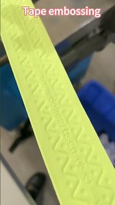 Automatic logo embossing machine for tape/textile