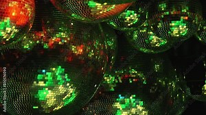 Vibrant disco balls reflecting assorted colors creating a lively dance floor ambiance. Part of series Disco Balls Illuminated.