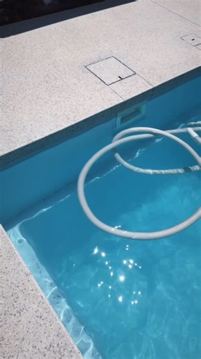 STOP IT 😍 Designed to turn heads, our seamless edge concrete pool surround features beautifully curved corners for @nupool_au Beautiful grind as always @innovativepolishedconcrete The new pre-set corners from @stealth_lids works a treat 👌🏼 #concrete #pool #honedconcrete #poolsurround #seamlessedge | Tylers Landscapes