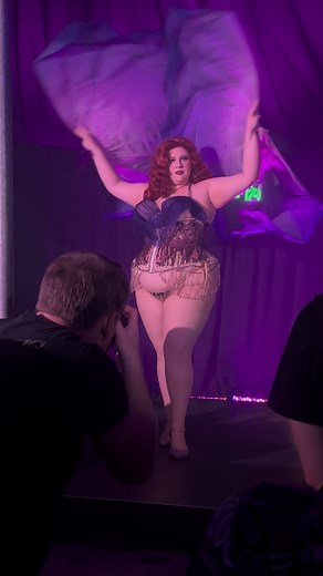 Fun Performance with Flowy Fans and Plussize Dancer