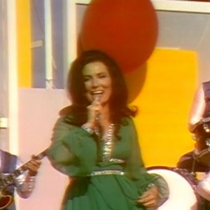 Tonight's the night Loretta Lynn is back for another dazzling Sunday premiere. This time, she's performing "You Ain't Woman Enough" 💋 Don't forget to tune into our @Youtube at 5 pm PT/8pm ET https://EdSullivan.lnk.to/WomanEnoughFP | The Ed Sullivan Show