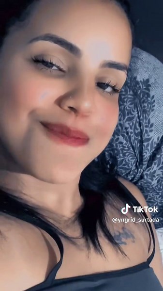 Cursive Tattoo Close-Up on Upper Chest