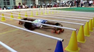 These kids have perfected "limbo skating." Those bars are NINE inches off the ground. | Insider