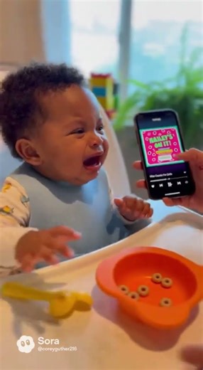 Baby crying over rap song