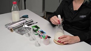 Scientist Preparing Milk Sample for Testing