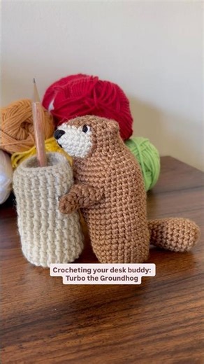 Crochet an adorable groundhog and its handy basket for pens or crochet hooks.