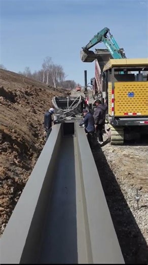 Precision in Construction: Forming a Drainage Channel with Slipform Paving