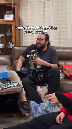 §pacə Gyp§y 🌌🧞‍♀️ on Instagram: "Yall getting really creative with gifts aren’t you 😭💀 #explorepage #viral #whiteelephant #christmasparty #tentacle"