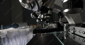 Microscope flask test tubes in modern laboratory closeup. Medical research equipment and medical instruments