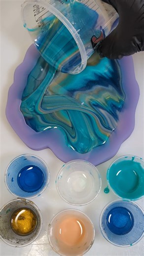 Pouring our new monstera leaf mold! This tray is a lovely size, and the raised sections give it such a unique feel. 💚 #resinpour #resinart #epoxyart #resinmold #resinmolds | Resin Queen